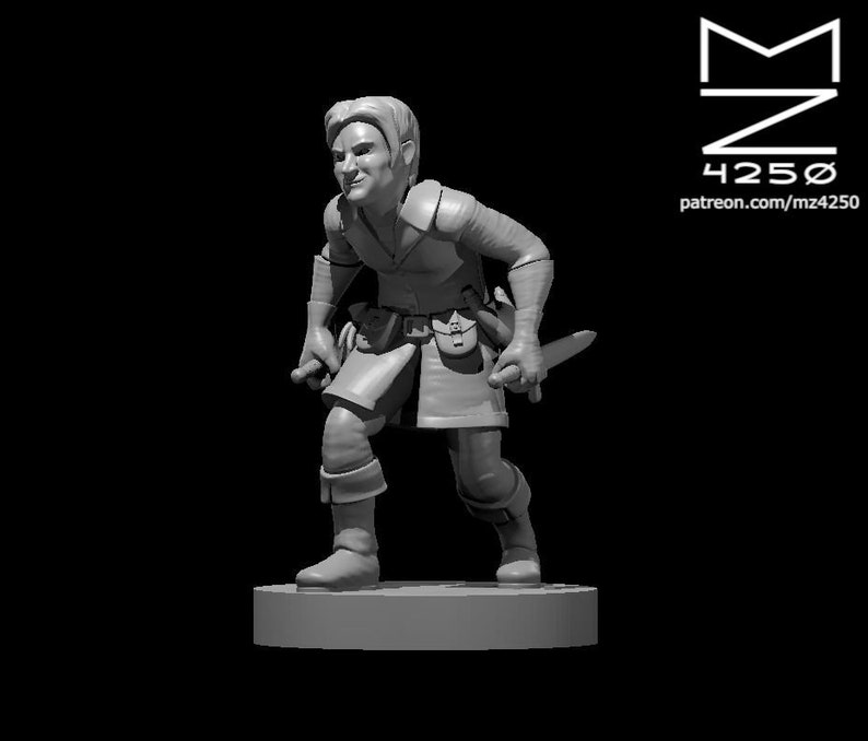 May include: A gray miniature figurine of a person wearing a tunic and holding a dagger. The figurine is standing on a round base.