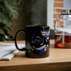 Tasse noire 11 oz bébé orque
