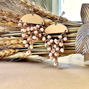 Light pink dangle beaded earrings