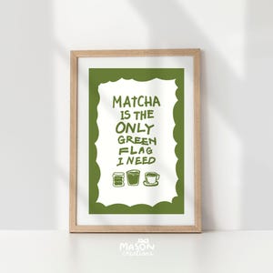 May include: A green and white framed print with the text "Matcha is the only green flag I need" and three illustrations of cups of matcha.