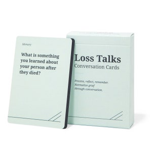 May include: A set of conversation cards called "Loss Talks" with a light blue background and black text. The card shown has the text "What is something you learned about your person after they died?" and the category "Memory".