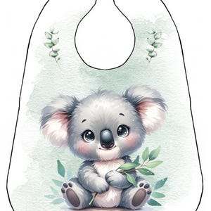 Peut inclure: Bavoir pour bébé avec une illustration à l'aquarelle d'un mignon koala tenant des feuilles d'eucalyptus. Le koala est gris avec des accents roses, sur un fond vert clair. Le bavoir a une bordure blanche et un col incurvé.