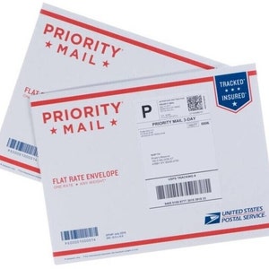 May include: A white Priority Mail envelope with a USPS tracking label. The label includes the tracking number, Priority Mail 3-Day, and the text "Tracked Insured".