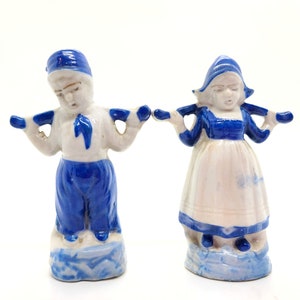 Delft-style Dutch boy and girl figurines made in Japan