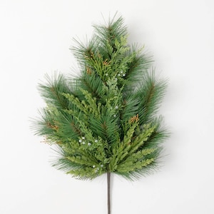 May include: A green artificial pine and cedar sprig with small white berries. The sprig is perfect for adding a touch of greenery to your home decor.