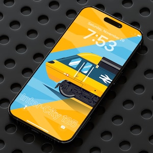 May include: A smartphone displays a vibrant wallpaper featuring a yellow and blue Inter-City 125 train illustration. The screen shows the time as 7:53 on Saturday, November 26. The phone rests on a dark, textured surface.