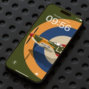 May include: A smartphone screen shows a wallpaper with a vintage aircraft design. The background is a target-like pattern in green, orange, and blue. The illustration depicts a propeller plane. The time displayed is 09:56 on Thursday 2nd October.