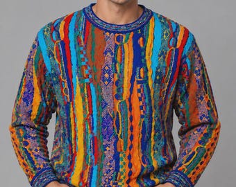 May include: A long-sleeve crew neck sweater featuring a vibrant, multi-colored vertical striped pattern in shades of blue, yellow, orange, red, and green, with intricate textured knit details and a ribbed collar, cuffs, and hem.