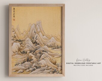 Puede incluir: Una impresión enmarcada de una pintura de paisaje asiático. La obra presenta montañas, árboles y un río en tonos apagados de beige, marrón y verde. El marco es de madera clara. El texto en la impresión dice "Asian Heritage" y "Digital Download Printable Art".