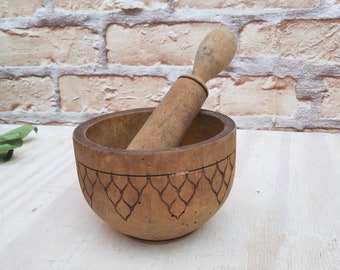 Vintage wooden mortar and pestle, antique kitchenware, vintage rustic decor.