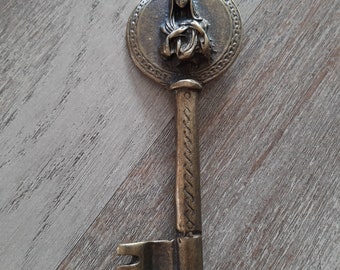 Old door key. Village key. Antique key. Brass key. Decorative key. Large skeleton key. Attractive wall decor.