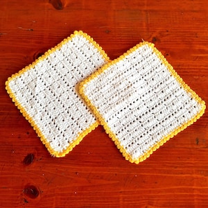Decorative napkins. Hot pot handles.Set (2 pcs. white with yellow). Knitted table mats. Vintage decoration