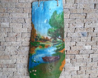 Decoupage on clay tiles. Old decorated brick. Wall decoration. Home decor. Artistic decoupage. Ceramics on the wall.