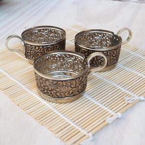 Set of 3 vintage hot tea holders. Traditional Russian coasters. Metal cup holders. Kitchen decor.