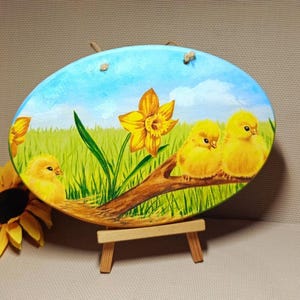 Wooden sign with little chicks. Hanging wall decor with a spring mood. Decoupage picture. Wall sign.