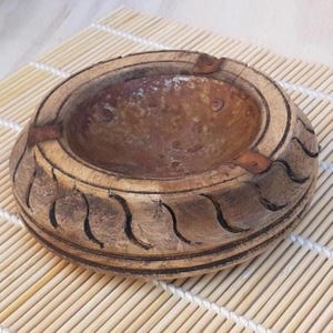 Vintage metal and wood ashtray.