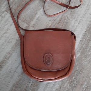 Vintage brown leather bag. Small handbag made of genuine leather. Shoulder bag.