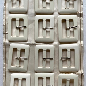Vintage plastic buckles/ 12 vintage plastic buckles/ 12 Vintage buckles/ 12 white plastic buckles