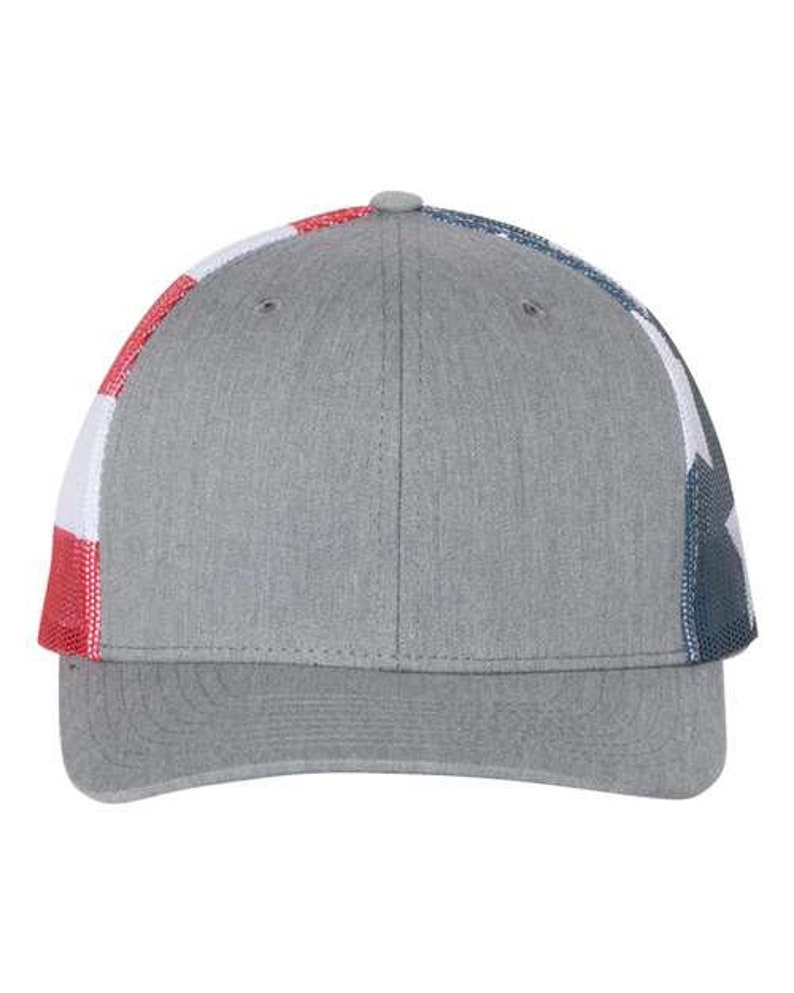 May include: A gray and white trucker hat with a red, white, and blue American flag design on the side.