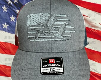 American flag hat with flag and ducks
