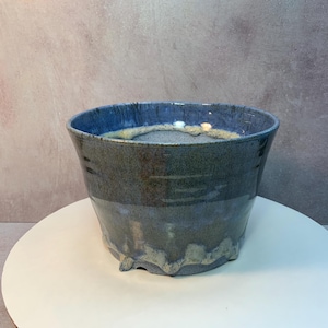 Planter. Handmade ceramic potterty, thrown on wheel, drainage hole in base. 5.75 at rim, 4 inches height. Thrown with blue stoneware clay.