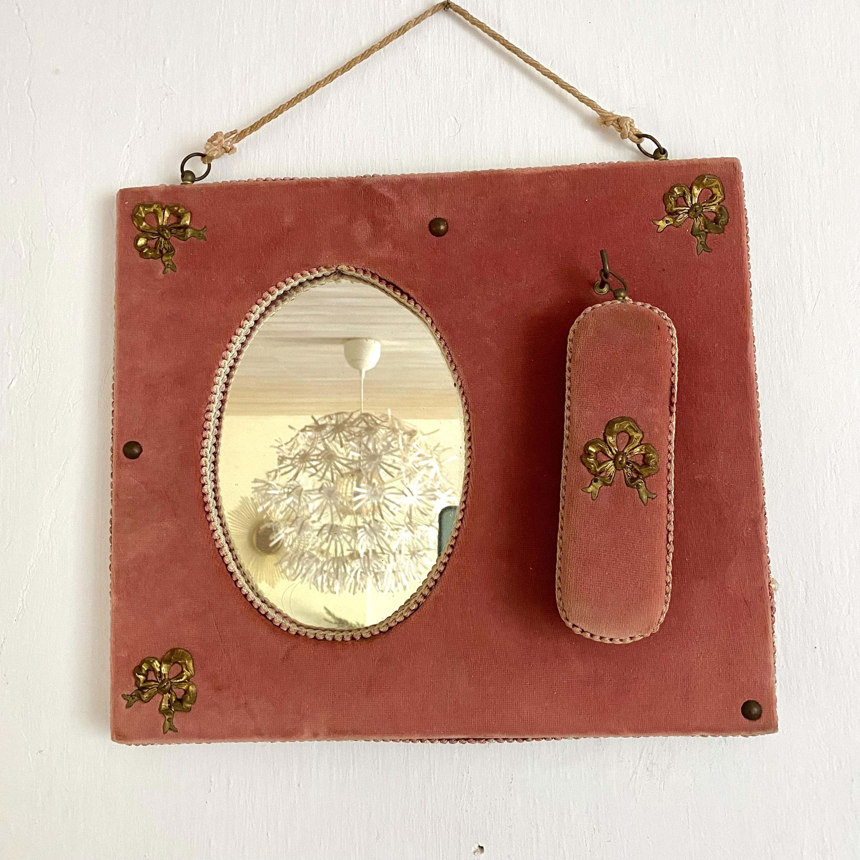 60s pink velvet hall mirror with clothes brush