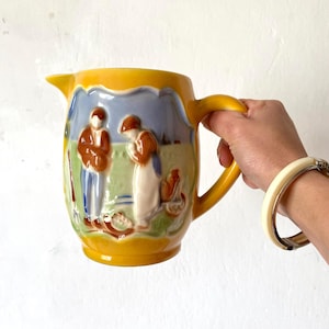 Poët Laval slipware-kanna, Angelus-mönster, fransk majolika