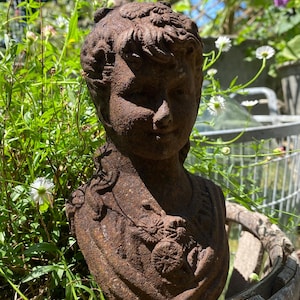 Female bust, cast iron garden decoration, Female bust, cast iron garden decoration