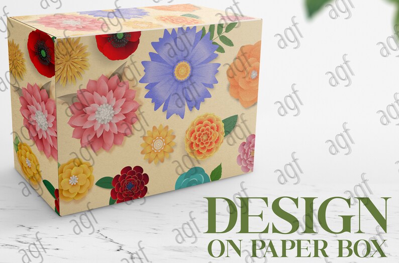 May include: A cardboard box featuring a floral design. The box is decorated with paper flowers in a variety of colours, including red, pink, yellow, blue, and orange. The flowers are arranged in a random pattern on the box.