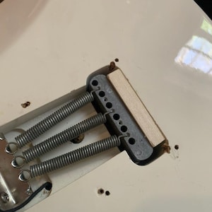custom cut wood block for hardtail mod stratocaster tremelo system