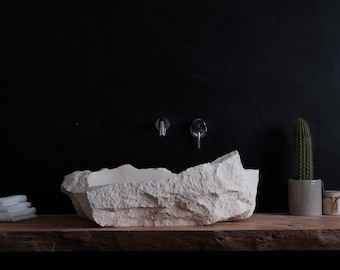 Carved stone sink (Caliza capri)