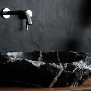 Handcrafted black marble sink