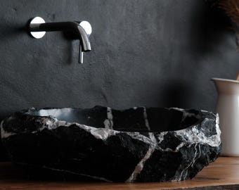 Handcrafted black marble sink