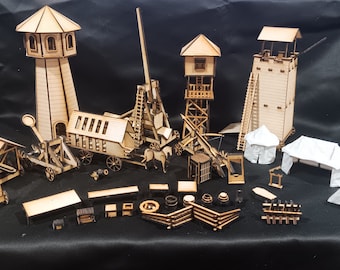 May include: A set of wooden miniature castle and siege weaponry models, including towers, a catapult, a trebuchet, tents, and other accessories. The models are unpainted and ready to be assembled.