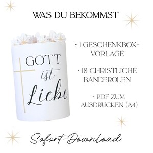 May include: A white cylindrical gift box with the words "GOTT ist Liebe" and a gold cross. The box is decorated with white floral accents and the text "WAS DU BEKOMMST" and "Sofort-Download".