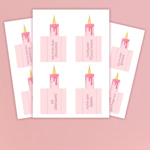 May include: Pink candle-shaped cards with yellow flames and pink wax drips. Each card has a different German phrase, including "You are special" and "You make every moment more beautiful."