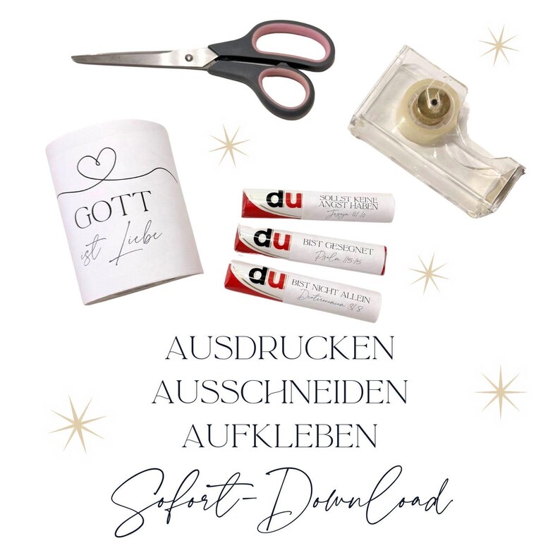 May include: An assortment of craft supplies including scissors, tape dispenser, and decorative tape. A white cylindrical container with the words "GOTT ist Liebe" is also present. The image also includes the words "AUSDRUCKEN, AUSSCHNEIDEN, AUFKLEBEN, Sofort-Download".