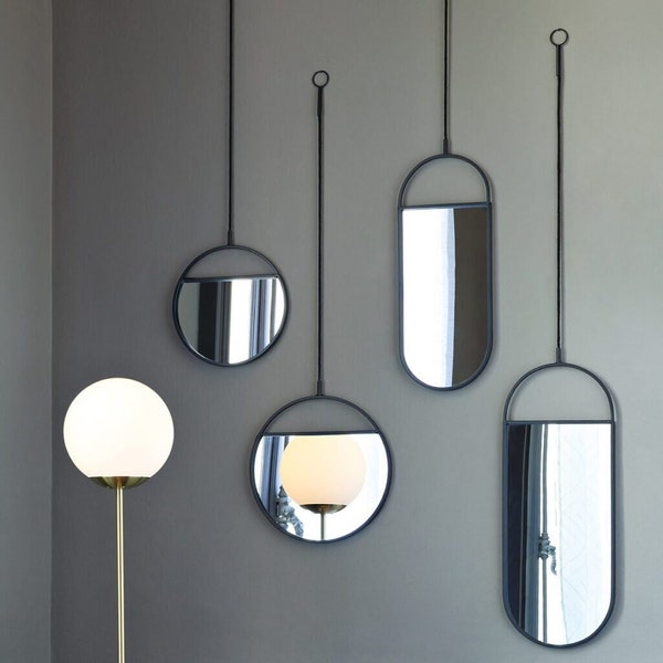Suspended Hanging Mirror with a Brass Frame
