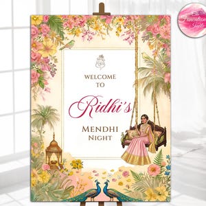 May include: A decorative welcome sign for Riddhi's Mehndi Night. The sign features floral and peacock illustrations, with a woman on a swing. The text reads "Welcome to Riddhi's Mehndi Night".