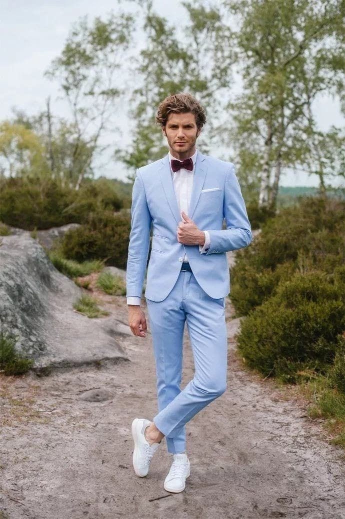 Light blue blazer teamed with black trousers and tie  Blue blazer outfit  men Blue blazer men Light blue blazer mens