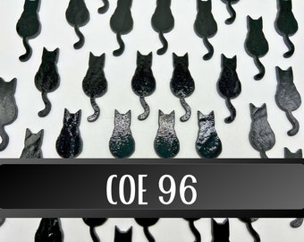 May include: A collection of black cat-shaped decorations against a white background. The cats have varying textures and poses, with curled tails. A black rectangle at the bottom displays the text "COE 96" in white.