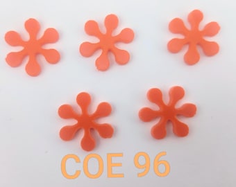 May include: Five orange glass flower-shaped cabochons with six rounded petals each. The pieces are arranged in a group, and the text COE 96 is printed in orange at the bottom of the image, indicating the glass compatibility coefficient.