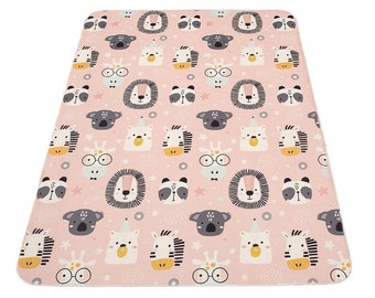 May include: A pink play mat with a repeating pattern of animal faces, including a lion, zebra, koala, giraffe, and panda. The animals are wearing hats and glasses.