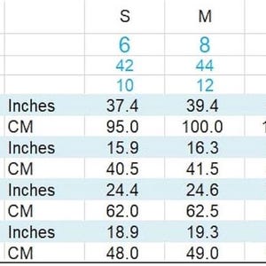 May include: A size chart for clothing, with measurements in inches and centimeters. The chart includes US, Italian, and UK sizes, along with bust, shoulder, and sleeve length measurements. Sizes range from S to XXL.