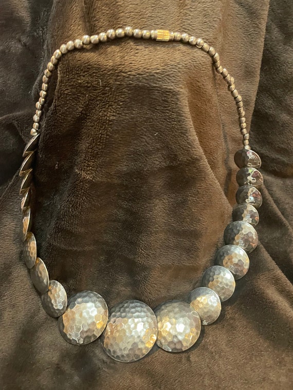 Magnificent hammered metal necklace