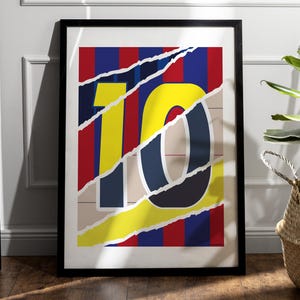May include: A framed print of the number 10 in yellow, blue, and red, with a ripped and layered design. The number is set against a background of red and blue stripes.