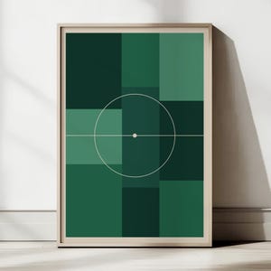 May include: A framed wall art print featuring a geometric composition of various shades of green rectangles. A thin white horizontal line crosses the centre, intersecting a large white circle with a small white dot at the exact centre point.
