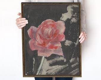 Peut inclure: Une peinture encadrée d'une seule rose rose sur fond noir avec un recouvrement texturé couleur or. La peinture mesure 40,6 x 50,8 cm.