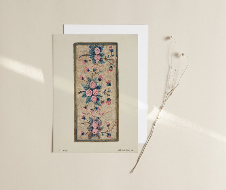 May include: A vintage needlepoint design featuring a floral motif with pink roses and green leaves on a cream background. The design is framed in a dark blue border.
