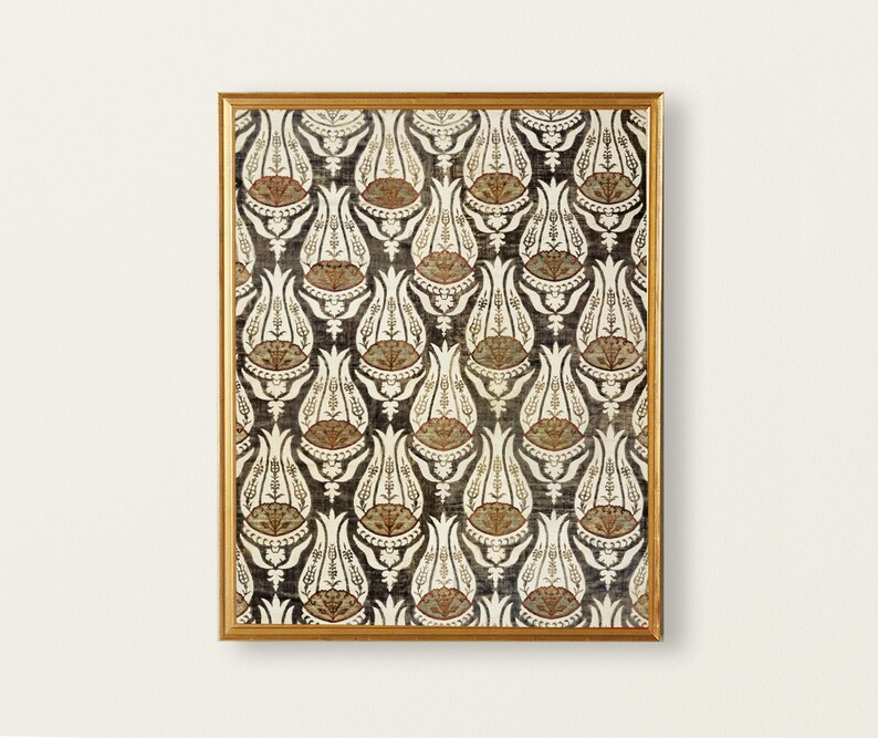 May include: A framed print of a vintage textile design featuring a repeating pattern of stylized tulips in shades of brown, white, and red on a dark background.